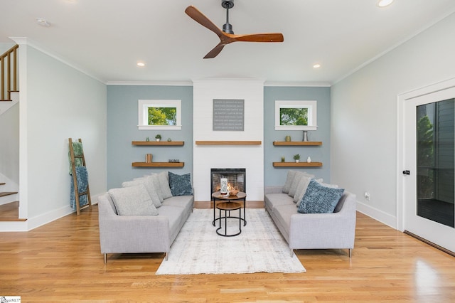 827 S Academy St, Greenville, SC 29601 - living room featuring stairway, ornamental molding, and plenty of natural light