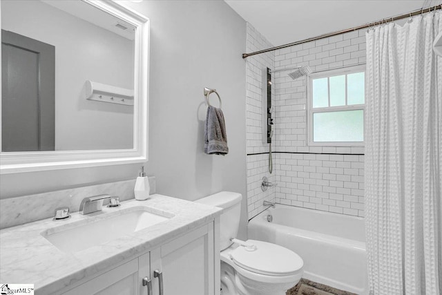 bathroom with toilet, vanity, and shower / bathtub combination with curtain