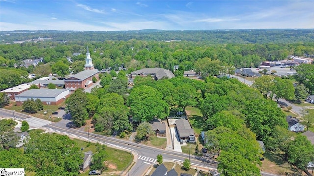 aerial view featuring a view of trees