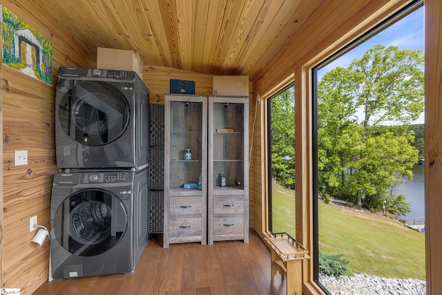 108A Holt Dr, Iva, SC 29655 - washroom with stacked washer / dryer, laundry area, wooden walls, wood finished floors, and wooden ceiling