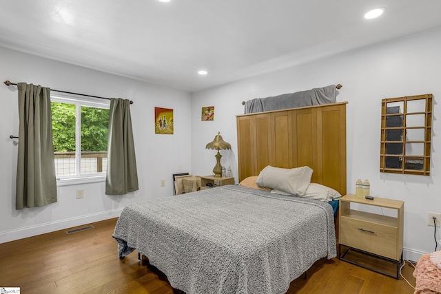 108A Holt Dr, Iva, SC 29655 - bedroom featuring baseboards, dark wood-type flooring, visible vents, and recessed lighting