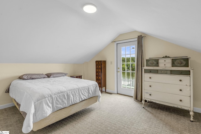 108A Holt Dr, Iva, SC 29655 - carpeted bedroom with vaulted ceiling, access to exterior, and baseboards