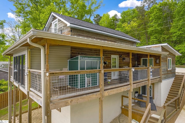 108A Holt Dr, Iva, SC 29655 - view of side of home featuring roof with shingles and stairs
