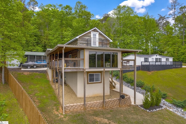 108A Holt Dr, Iva, SC 29655 - rear view of property with a yard, a fenced backyard, and a balcony