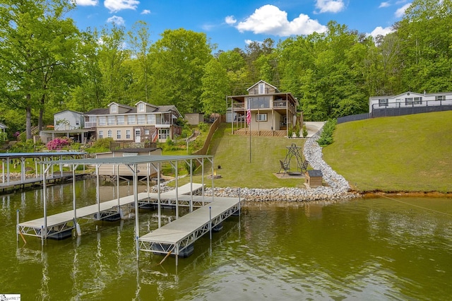 108A Holt Dr, Iva, SC 29655 - dock area with a deck with water view, boat lift, fence, a lawn, and stairway