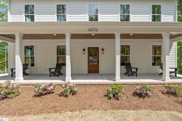 property entrance with a porch