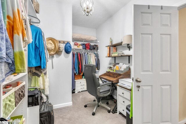office space with baseboards and carpet floors