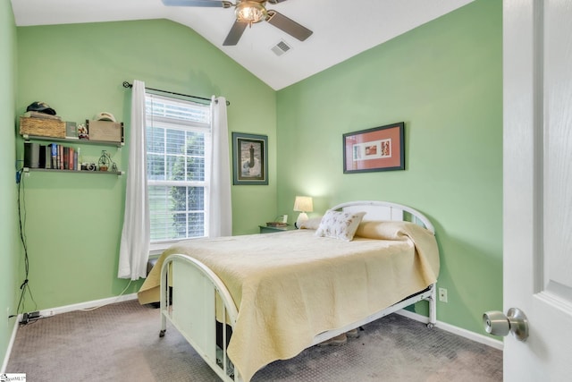 carpeted bedroom featuring vaulted ceiling, visible vents, baseboards, and ceiling fan