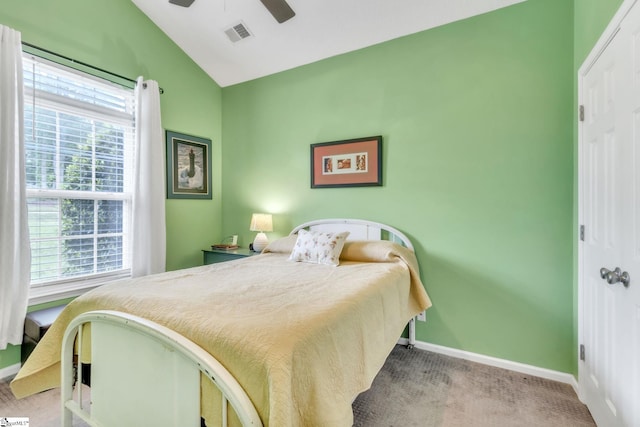 bedroom with carpet flooring, baseboards, visible vents, lofted ceiling, and a ceiling fan