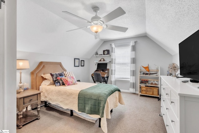 bedroom with ceiling fan, light carpet, and lofted ceiling