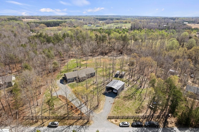 drone / aerial view with a forest view