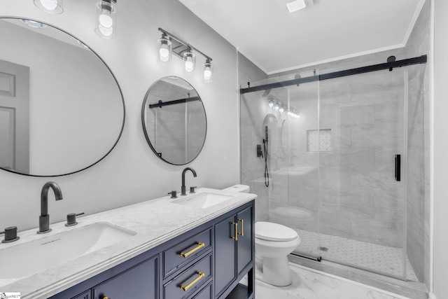 full bathroom with a shower stall, toilet, a sink, and double vanity