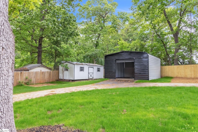 view of shed featuring fence