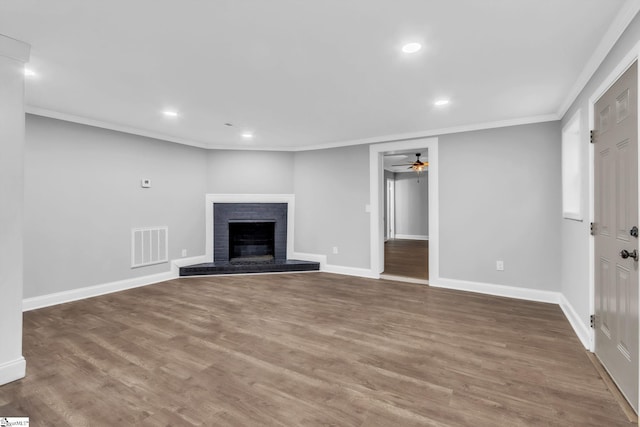 unfurnished living room featuring recessed lighting, visible vents, a ceiling fan, ornamental molding, and baseboards