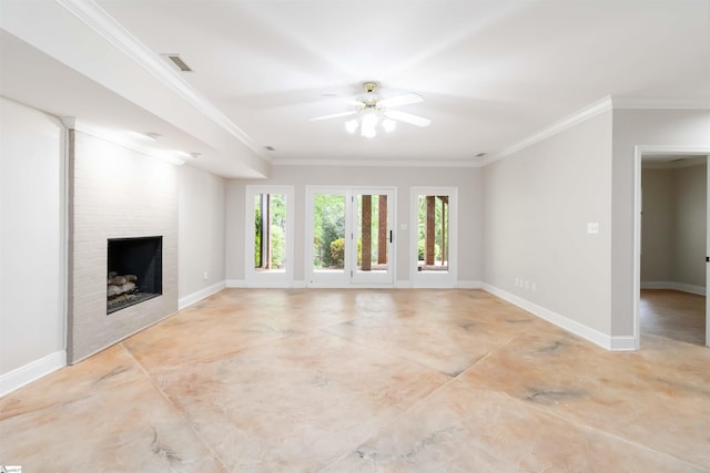 unfurnished living room featuring baseboards, a large fireplace, ceiling fan, and crown molding
