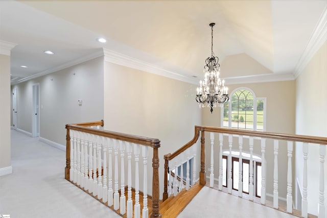 hallway featuring a notable chandelier, an upstairs landing, baseboards, ornamental molding, and recessed lighting