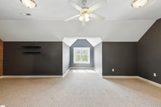bonus room with vaulted ceiling, carpet, and baseboards