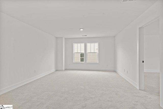 407 Briggs Dr, Easley, SC 29642 - spare room featuring carpet flooring and baseboards