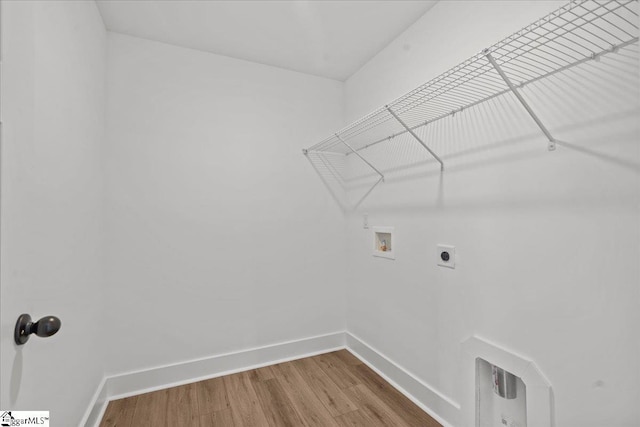 407 Briggs Dr, Easley, SC 29642 - laundry area featuring hookup for a washing machine, wood finished floors, baseboards, and hookup for an electric dryer