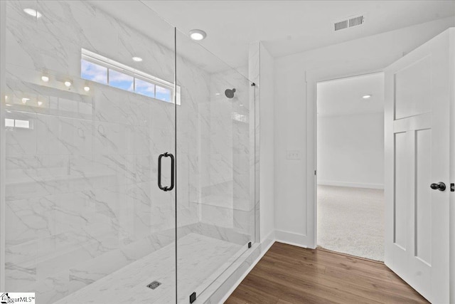 407 Briggs Dr, Easley, SC 29642 - bathroom with a marble finish shower, baseboards, wood finished floors, and recessed lighting