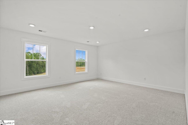 407 Briggs Dr, Easley, SC 29642 - unfurnished room with baseboards, light carpet, and recessed lighting