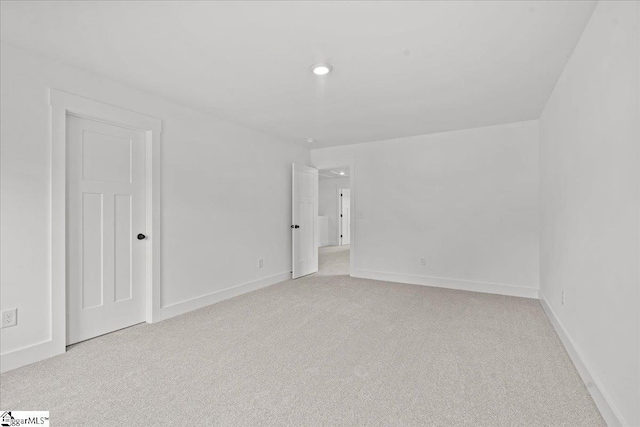 407 Briggs Dr, Easley, SC 29642 - spare room with light carpet, baseboards, and recessed lighting