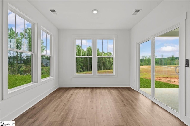 407 Briggs Dr, Easley, SC 29642 - unfurnished sunroom featuring healthy amount of natural light and wood finished floors