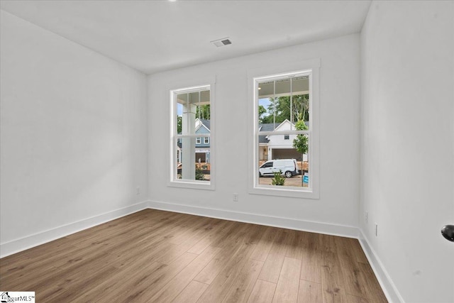407 Briggs Dr, Easley, SC 29642 - empty room with wood finished floors and baseboards