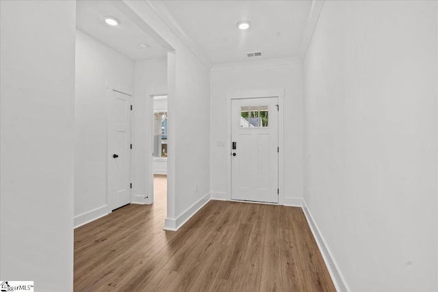 407 Briggs Dr, Easley, SC 29642 - foyer with wood finished floors, ornamental molding, and baseboards