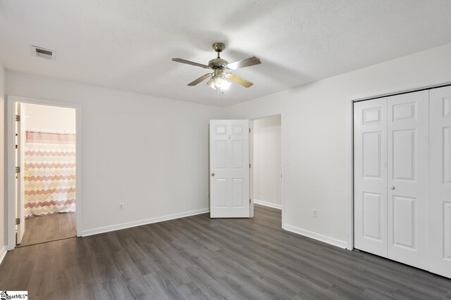 123 Sequayah Dr, Fair Play, SC 29643 - unfurnished bedroom with dark wood-style floors, baseboards, a closet, and a ceiling fan