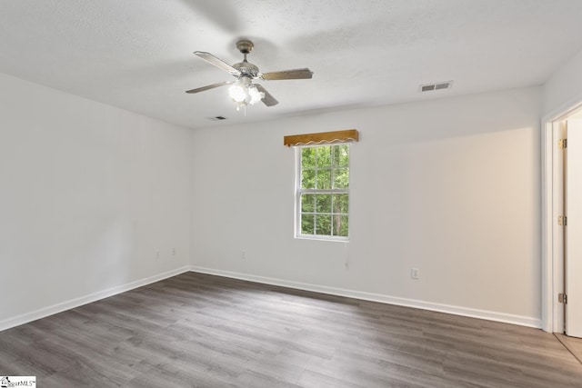 123 Sequayah Dr, Fair Play, SC 29643 - empty room with ceiling fan, wood finished floors, and baseboards