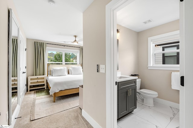 bedroom with visible vents and baseboards
