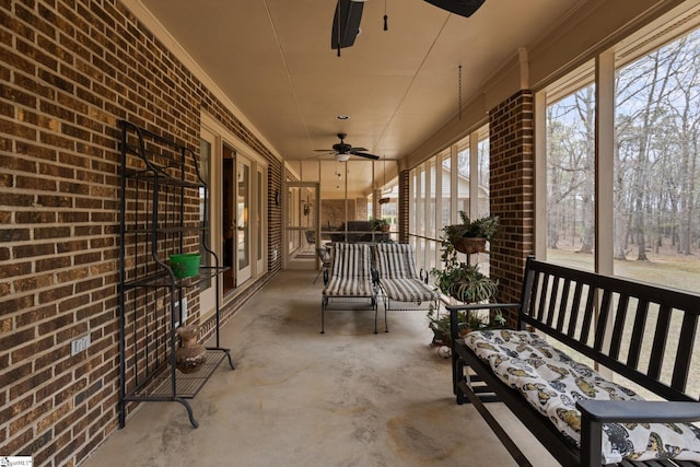 view of patio / terrace featuring a porch, ceiling fan, and french doors