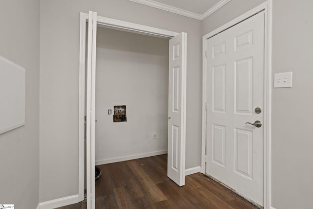 washroom with dark wood-type flooring, baseboards, and ornamental molding