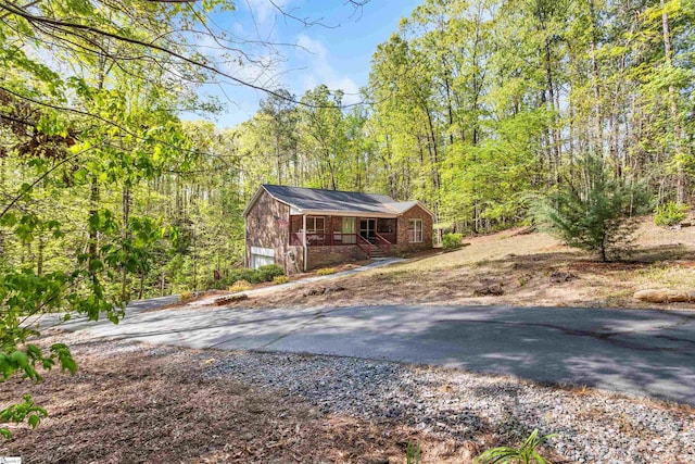112 Jocassee Falls Rd, Salem, SC 29676 - view of home's exterior with a view of trees and aphalt driveway