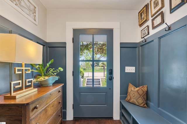 entryway with dark wood-style flooring