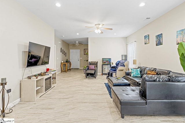 living area with recessed lighting, visible vents, a ceiling fan, and baseboards