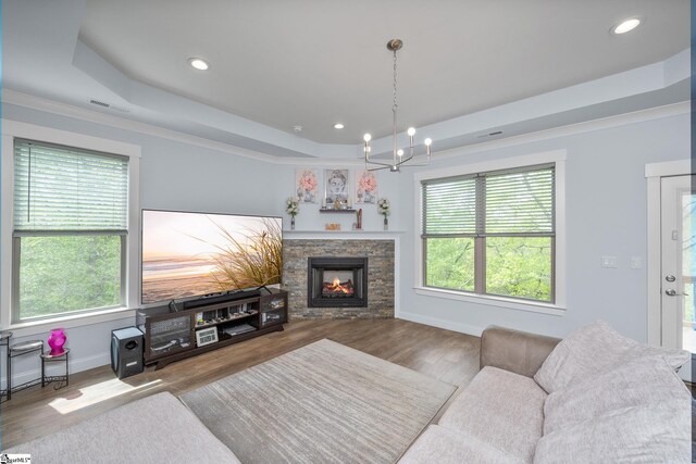 885 Affirmed Dr, Boiling Springs, SC 29316 - living area with wood finished floors, a wealth of natural light, and a raised ceiling