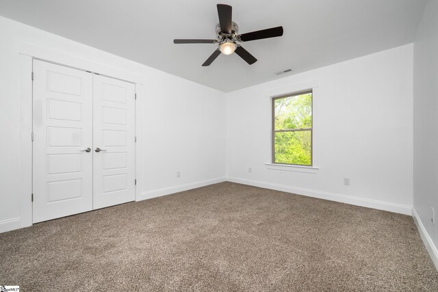 885 Affirmed Dr, Boiling Springs, SC 29316 - unfurnished bedroom with a closet, carpet, visible vents, and baseboards
