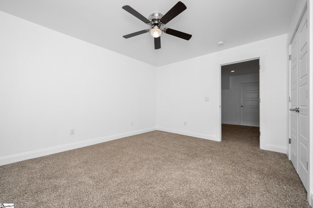 885 Affirmed Dr, Boiling Springs, SC 29316 - unfurnished bedroom with a ceiling fan, baseboards, and carpet