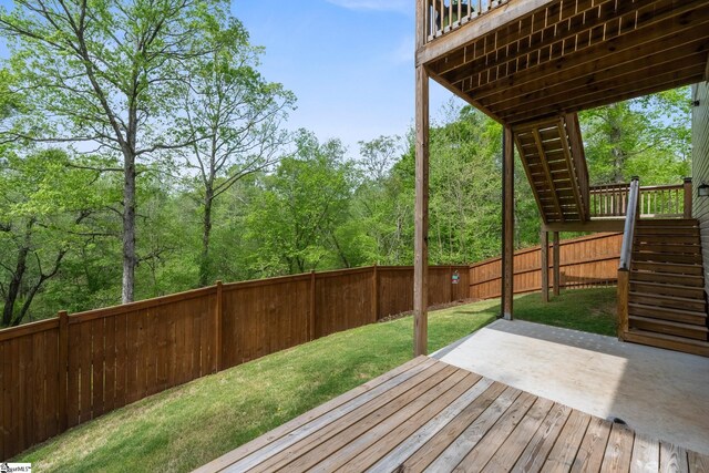 885 Affirmed Dr, Boiling Springs, SC 29316 - wooden terrace with a fenced backyard, stairway, a patio, and a lawn
