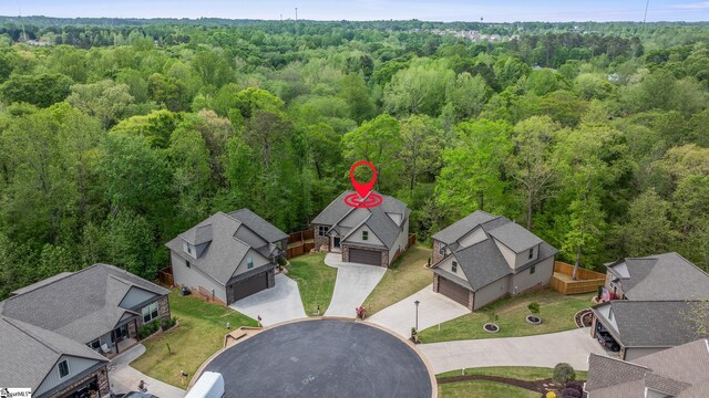 885 Affirmed Dr, Boiling Springs, SC 29316 - drone / aerial view featuring a residential view and a wooded view