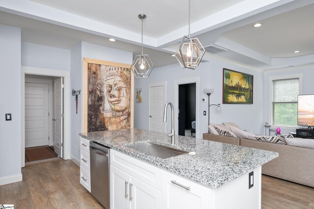 885 Affirmed Dr, Boiling Springs, SC 29316 - kitchen featuring dishwasher, open floor plan, a sink, and light wood finished floors