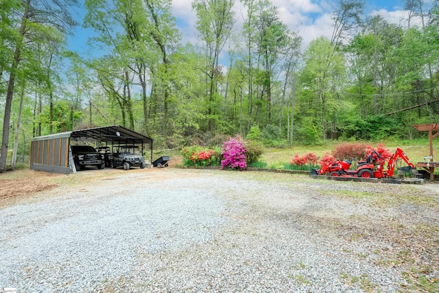 409 Freeman Bridge Rd, Marietta, SC 29661 - view of parking featuring driveway and a carport