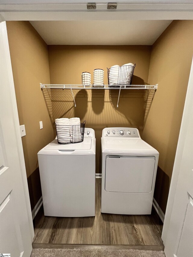 1236 Forestbrook Ln, Spartanburg, SC 29303 - laundry area featuring baseboards, laundry area, washing machine and dryer, and wood finished floors