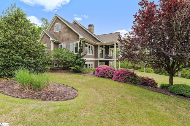 295 Chastain Hill Rd, Taylors, SC 29687 - view of front of home with a chimney, a front lawn, and stucco siding