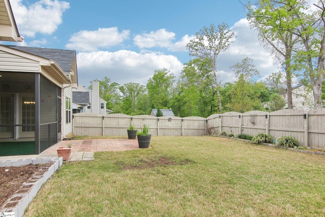 view of yard featuring a fenced backyard and a patio