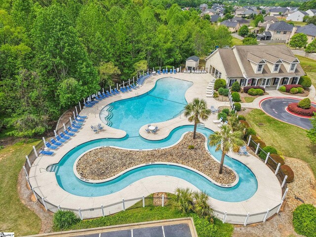 view of pool with fence