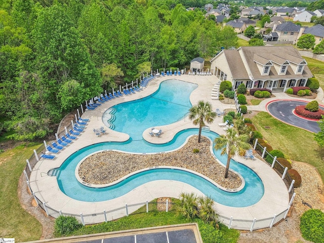 view of pool with fence