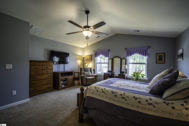 bedroom featuring a ceiling fan, carpet floors, lofted ceiling, and visible vents